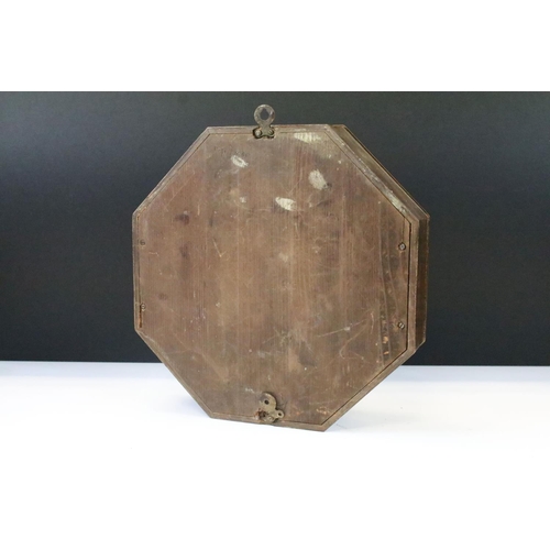 54 - Art Deco oak cased octagonal wall clock with cream dial, Arabic numerals and poker hands. Measures 2... 