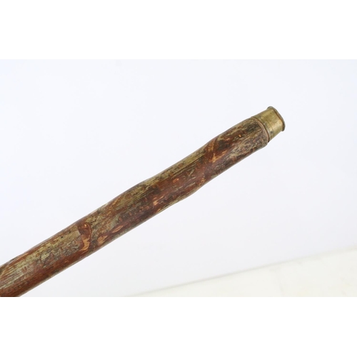 55 - Vintage wooden walking stick of spiralling form, approx 102cm long