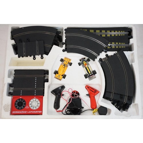 280 - Four boxed Scalextric sets to include Le Mans 24hr, Formula One, Velodrome Cycling and Micro Mini Ma... 