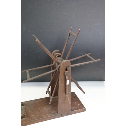 285 - A antique wooden wool winder together with a small collection of vintage fishing tackle to include a... 