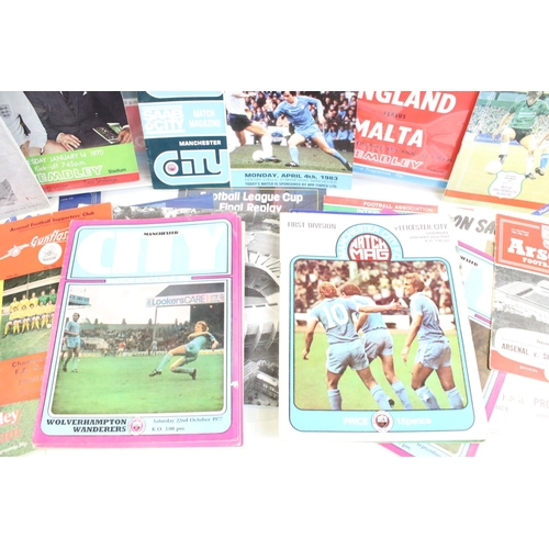 117 - Collection of football programmes from the 1950s to the 1990s featuring various clubs and cup finals... 