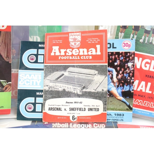 117 - Collection of football programmes from the 1950s to the 1990s featuring various clubs and cup finals... 