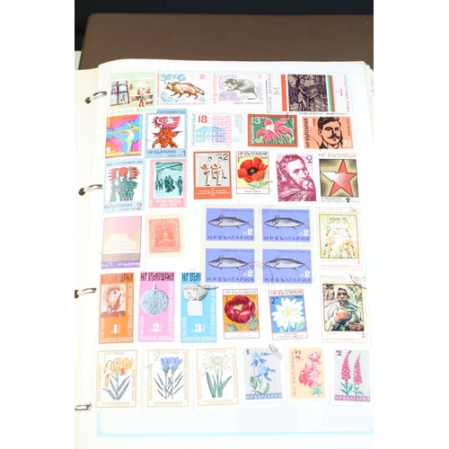 203 - A collection of mixed stamps within albums to include British, World and Commonwealth examples toget... 