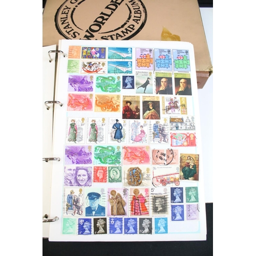 203 - A collection of mixed stamps within albums to include British, World and Commonwealth examples toget... 