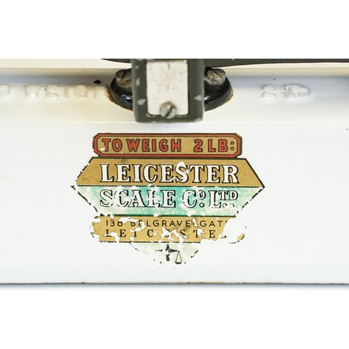 15 - Set of early - mid 20th C Leicester Scale Co Ltd enamel weighing scales 'to weigh 2lb', decal showin... 