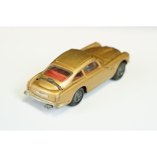 48 - Boxed Corgi 261 James Bond Aston Martin DB5 diecast model, with ejector henchman figure, secret inst... 