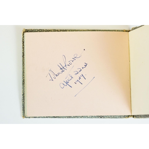 58 - Film Autographs - Book containing clear pen autographs of Stan Laurel and Oliver Hardy dated 26th Ma... 