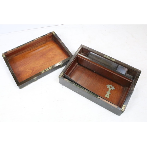 295 - A mahogany brass banded writing slope with fitted interior together with another writing slope.