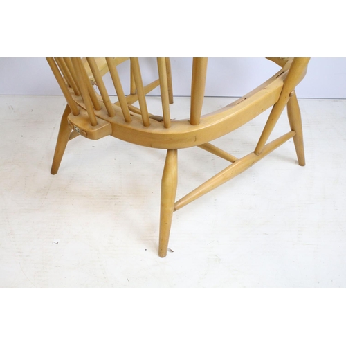 374 - Ercol stick back arm chair in need of restoration