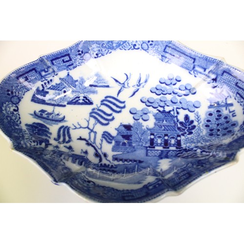 294 - Collection of blue and white pottery and porcelain, to include: various willow pattern, to include t... 