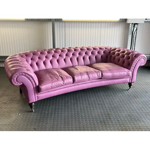 376 - Three seater lilac / pink leatherette contemporary Chesterfield sofa, with button back back and arms... 