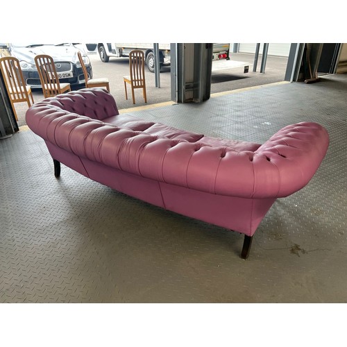 376 - Three seater lilac / pink leatherette contemporary Chesterfield sofa, with button back back and arms... 