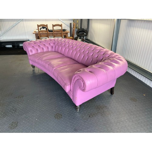 376 - Three seater lilac / pink leatherette contemporary Chesterfield sofa, with button back back and arms... 