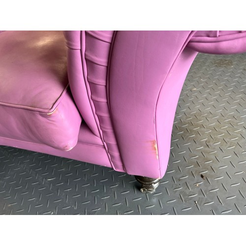 376 - Three seater lilac / pink leatherette contemporary Chesterfield sofa, with button back back and arms... 