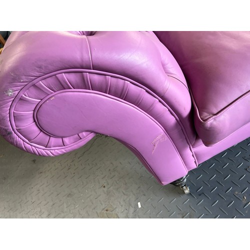 376 - Three seater lilac / pink leatherette contemporary Chesterfield sofa, with button back back and arms... 