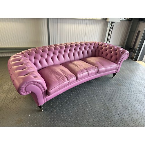 376 - Three seater lilac / pink leatherette contemporary Chesterfield sofa, with button back back and arms... 