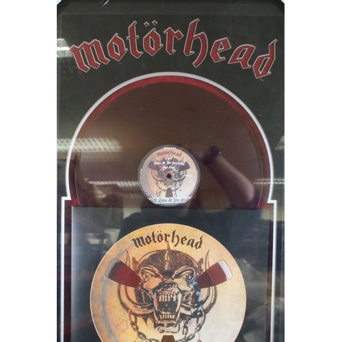 1593A - Memorabilia / Autographs - Motorhead framed and glazed display containing a drum skin signed by Lemm... 