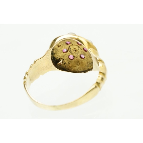 44 - 19th Century Victorian ruby and pearl ring. The ring having a round head with half pearls and six cu... 