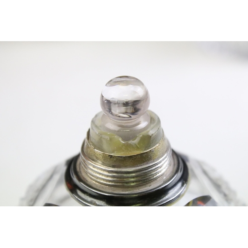 490 - Group of silver topped cut glass scent bottles including four of orb form and one square example. Ea... 