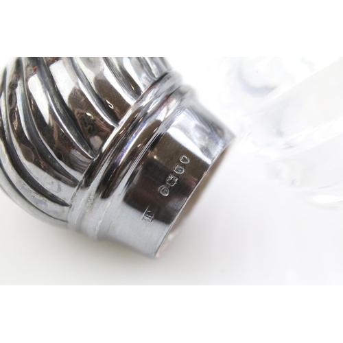 490 - Group of silver topped cut glass scent bottles including four of orb form and one square example. Ea... 