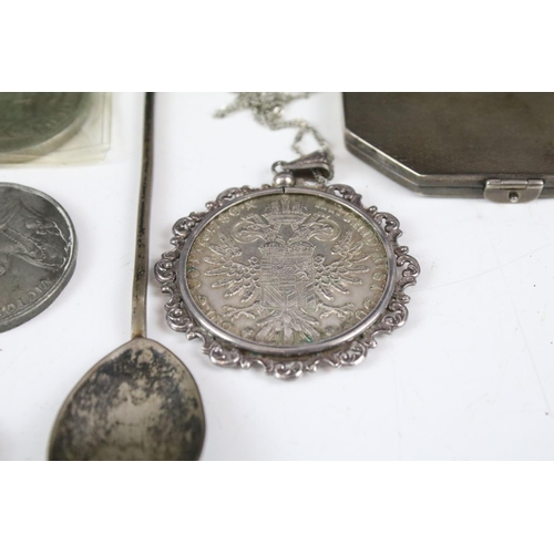 161 - A collection of coins and medallions, some silver examples, coin belt, brooch, silverware....etc..