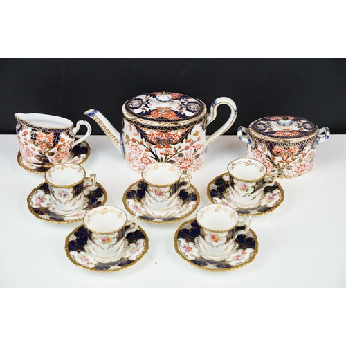 24 - Royal Crown Derby oval teapot, milk jug and lidded sugar basin decorated in the Imari pallete with 5... 