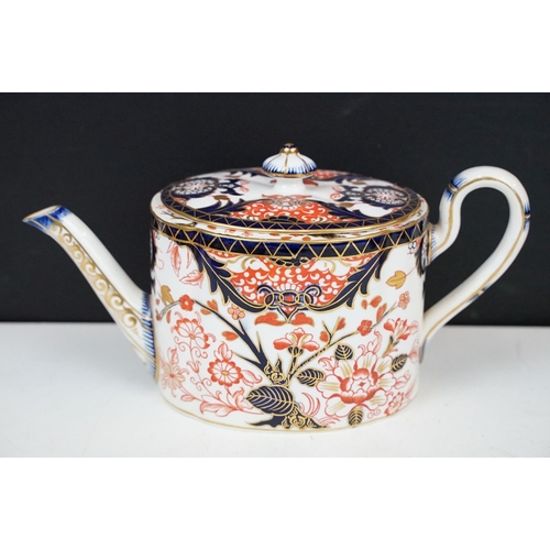 24 - Royal Crown Derby oval teapot, milk jug and lidded sugar basin decorated in the Imari pallete with 5... 