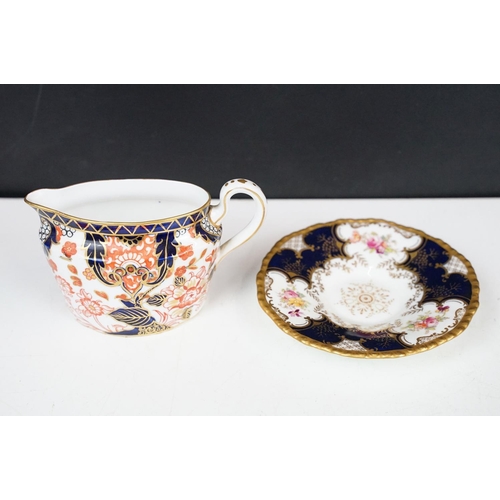 24 - Royal Crown Derby oval teapot, milk jug and lidded sugar basin decorated in the Imari pallete with 5... 