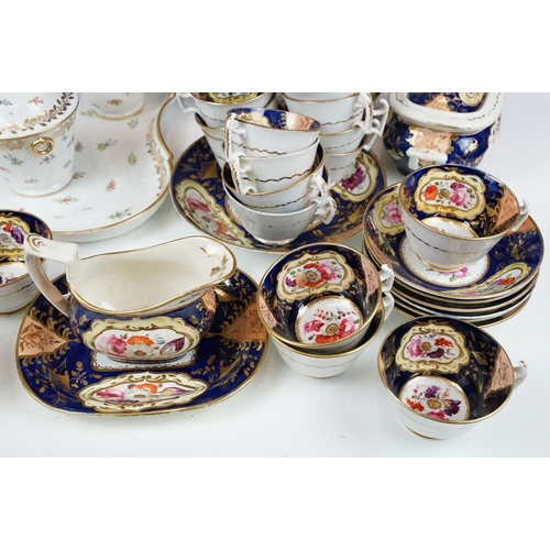 86 - 19th century Cobalt blue floral tea set with nine coffee cups, nine tea cups, six saucers, two plate... 