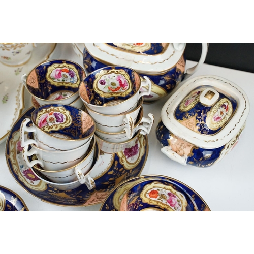 86 - 19th century Cobalt blue floral tea set with nine coffee cups, nine tea cups, six saucers, two plate... 