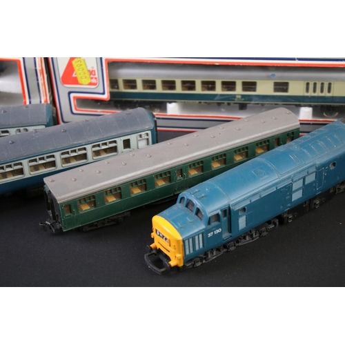 35 - Quantity of OO gauge model railway to include 4 x boxed Lima items of rolling stock, 7 x locomotives... 