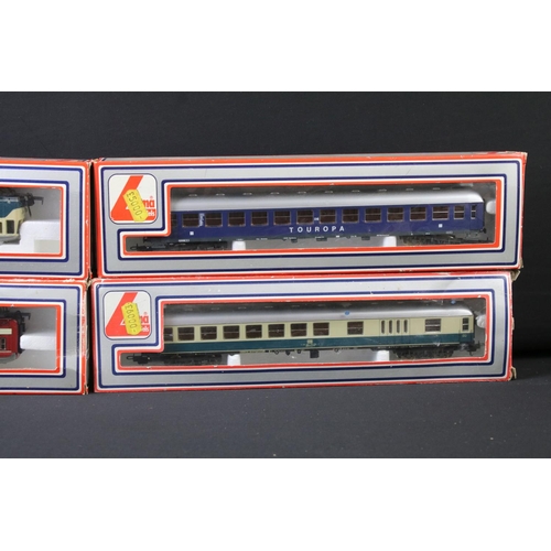 35 - Quantity of OO gauge model railway to include 4 x boxed Lima items of rolling stock, 7 x locomotives... 