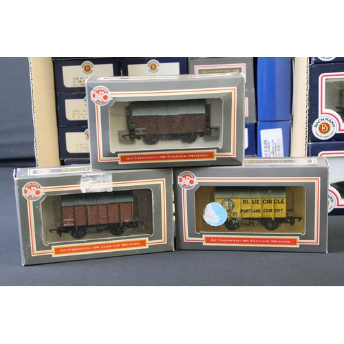 43 - 37 Boxed OO gauge items of rolling stock to include examples from Dapol and Bachmann featuring 21 x ... 