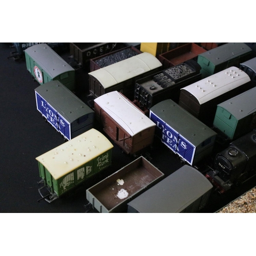 45 - Around 30 OO gauge items of rolling stock to include wagons and vans plus a built diecast metal loco... 