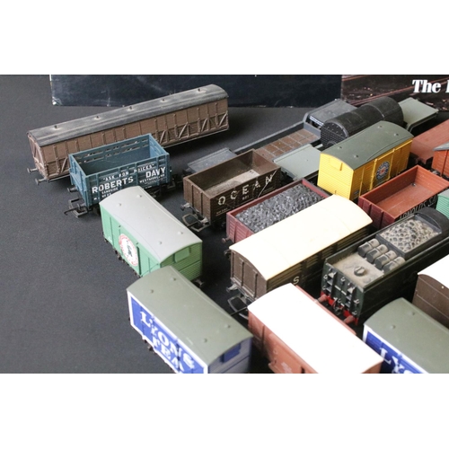 45 - Around 30 OO gauge items of rolling stock to include wagons and vans plus a built diecast metal loco... 