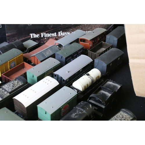 45 - Around 30 OO gauge items of rolling stock to include wagons and vans plus a built diecast metal loco... 