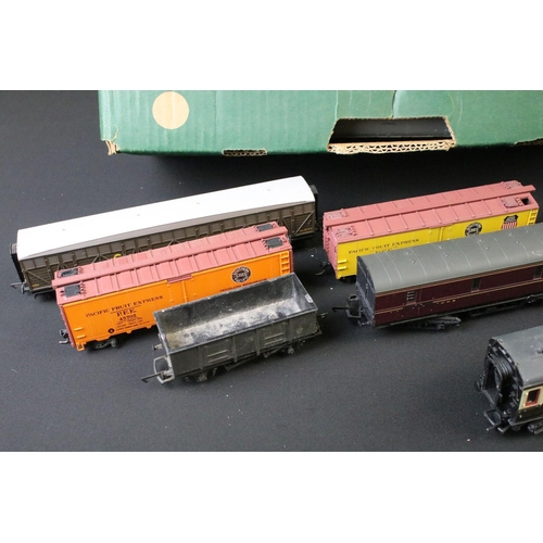 50 - Around 50 OO / HO gauge items of rolling stock to include coaches, mail coach, wagons and vans featu... 