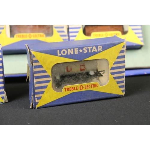 54 - Boxed Lone Star OOO Treble O Electric train set containing boxed locomotive, 6 x boxed items of roll... 