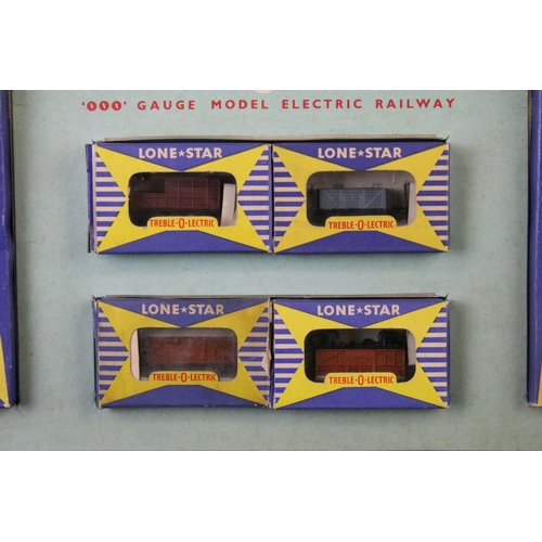 54 - Boxed Lone Star OOO Treble O Electric train set containing boxed locomotive, 6 x boxed items of roll... 