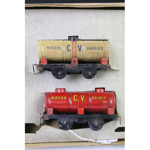 65 - Boxed Chad Valley O gauge Accessories Set containing Milk Tanker, Oil Tanker and 2 x BR Vans, tatty ... 