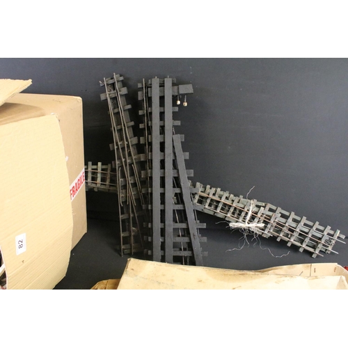 82 - Large quantity of G & O gauge track featuring various curves & straights, condition varies, plus a c... 