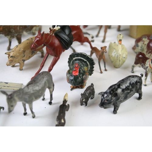 431 - Collection of early - mid 20th C play worn metal farming & hunting animals, figures and accessories ... 