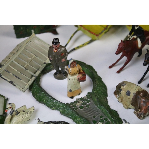 431 - Collection of early - mid 20th C play worn metal farming & hunting animals, figures and accessories ... 