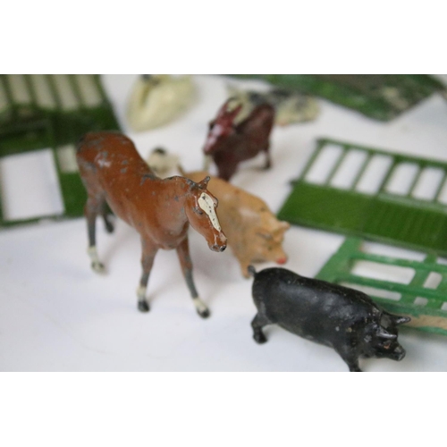 431 - Collection of early - mid 20th C play worn metal farming & hunting animals, figures and accessories ... 