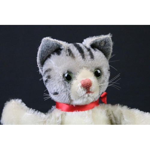 709 - Steiff - Two Steiff hand puppets to include 1 x cat and 1 x dog, both with red bow ties, both in vg ... 