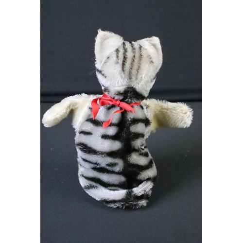 709 - Steiff - Two Steiff hand puppets to include 1 x cat and 1 x dog, both with red bow ties, both in vg ... 