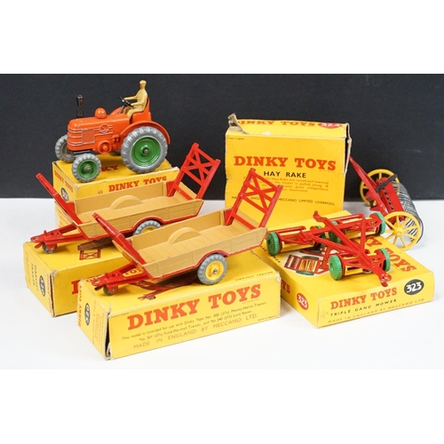 292 - Five boxed Dinky farming diecast models to include 301 Field Marshall Tractor in orange with driver ... 