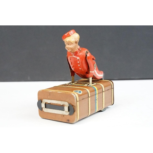 326 - Three Early-Mid 20th C German tin plate clockwork toys to include Schuco Peck Peck Bird, a DRGM mark... 