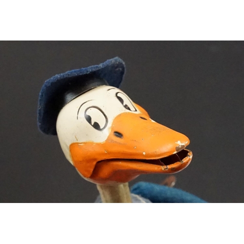 327 - Original Mid 20th C Schuco clockwork tin plate Donald Duck toy, with key, showing some wear and grub... 