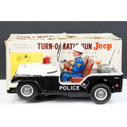 329 - Boxed TN Toys Japan Battery Operated Turn O Matic Gun Police Jeep, Jeep touch grubby otherwise gd, b... 